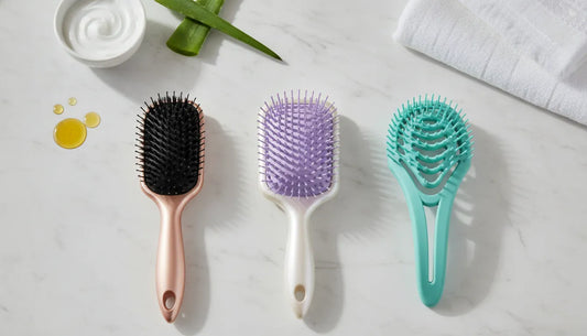 Best detangling brushes for breakage-prone hair in rose gold, lavender, and teal.
