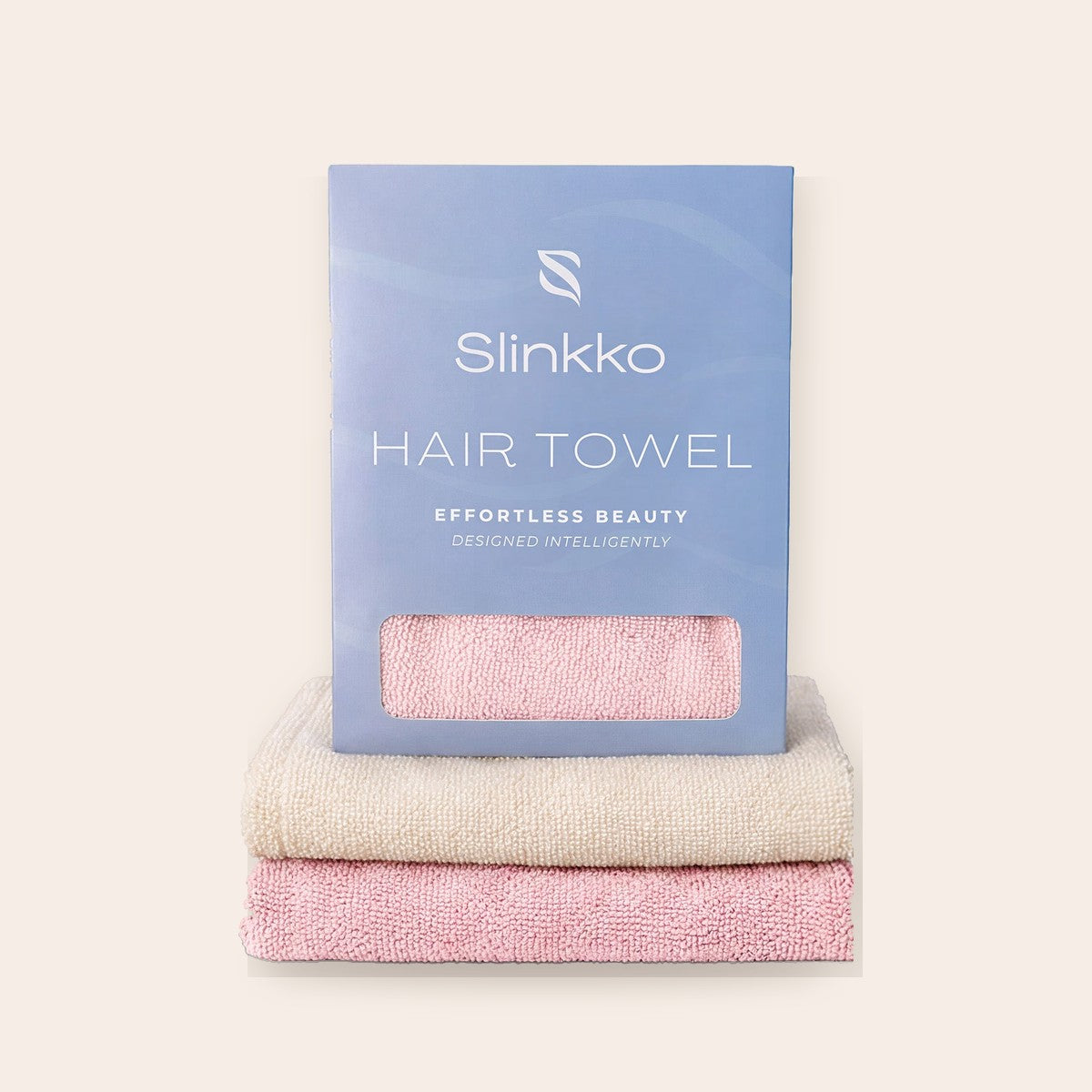 Slinkko microfiber hair towel in its packaging with folded towels